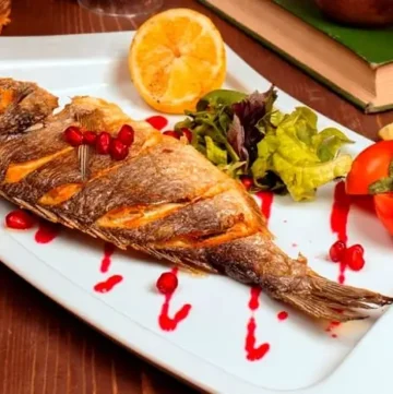 Oven baked red snapper with lemon wages